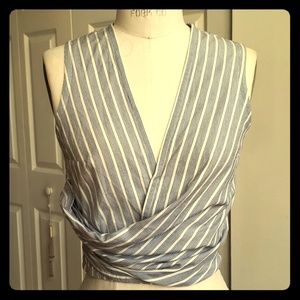 Sleeveless cotton faux wrap shirt